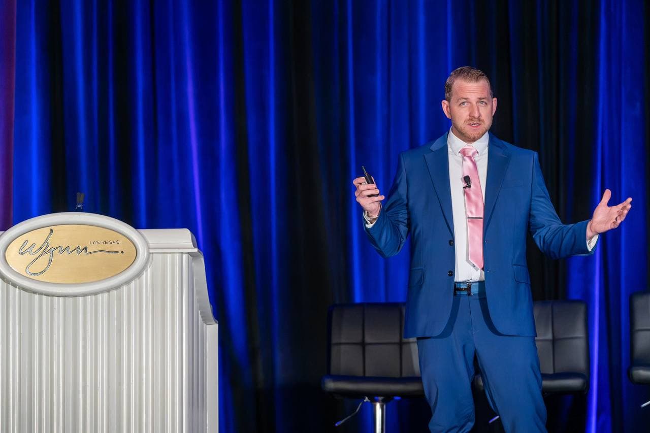 Dr. Morse presenting the Peptavo peptide curriculum on stage